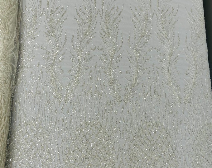 Off white feathers damask embroider and heavy beaded on a mesh lace fabric-sold by the yard-