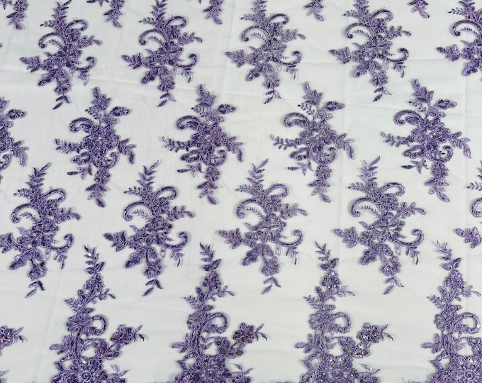 Lavender Lex floral design corded and embroider with sequins on a mesh lace fabric-prom-sold by the yard.