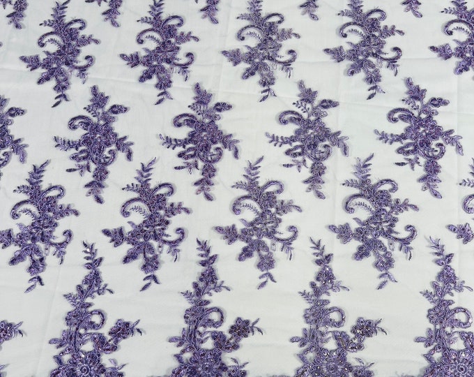 Lavender Lex floral design corded and embroider with sequins on a mesh lace fabric-prom-sold by the yard.