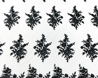 Black  floral corded embroider with sequins on a mesh lace fabric-prom-sold by the yard.