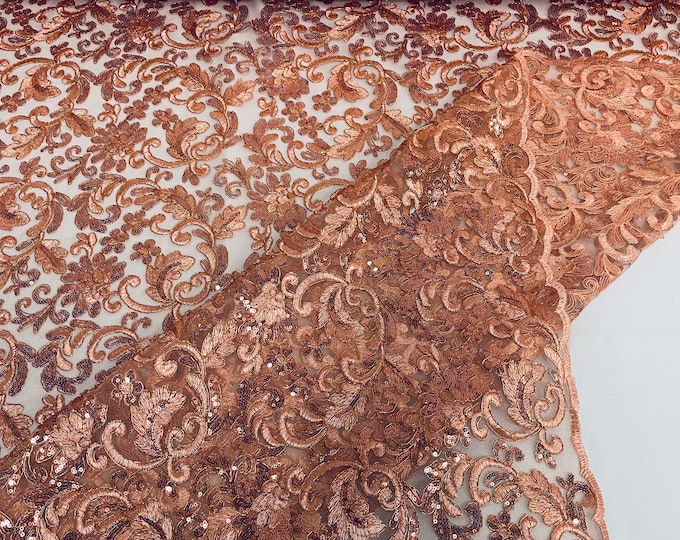 Copper metallic corded embroider flowers with sequins on a mesh lace fabric-prom-sold by the yard.