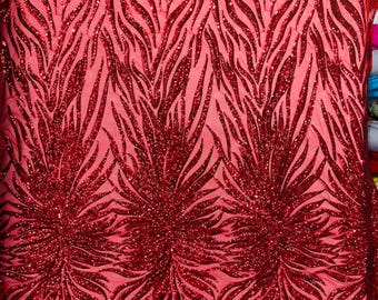 Red - Phoenix feather design with sequins embroider on a red 4 way stretch mesh fabric-sold by the yard.