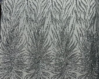 Silver - Phoenix feather design with sequins embroider on a white 4 way stretch mesh fabric-sold by the yard.