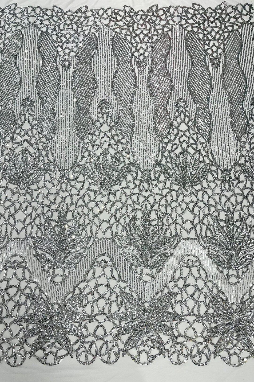 TURQUOISE SHINY SEQUIN DAMASK DESIGN EMBROIDERY ON A 4 WAY STRETCH MESH-1 YARD.