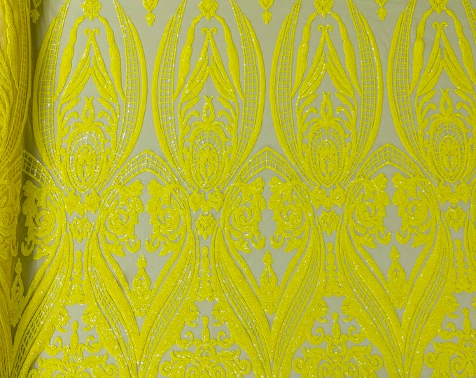 Yellow empire damask design with clear sequins embroider on a 4 way stretch mesh fabric-sold by the yard.