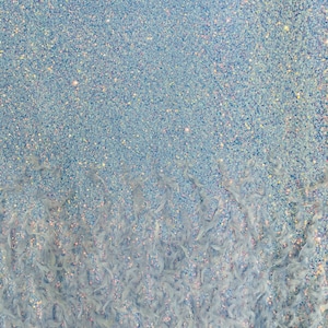 Light Blue Iridescent 5mm sequins on a stretch velvet with feathers  2-way stretch, sold by the yard
