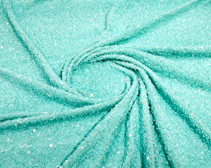 Mint 5mm sequins on a stretch velvet 2-way stretch, sold by the yard.