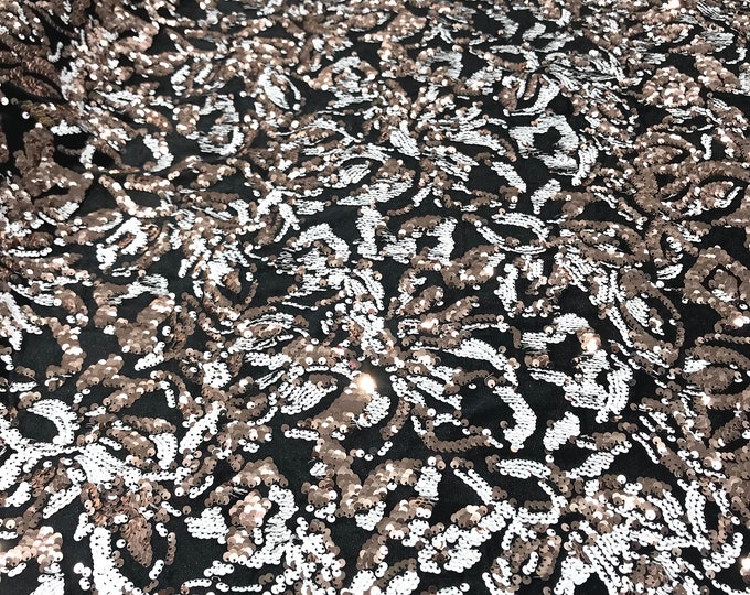Rose gold, white sequins flip two tone floral design on a black stretch velvet, Sold by the yard.