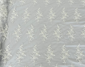 White  flower damask embroider with sequins and heavy beaded on a mesh lace fabric-sold by the yard.