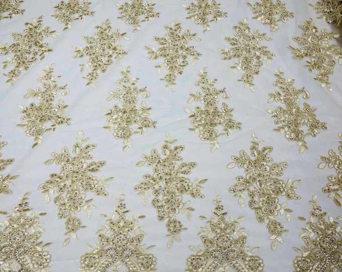 Beige flower lace corded and embroider with sequins on a mesh-Sold by the yard.