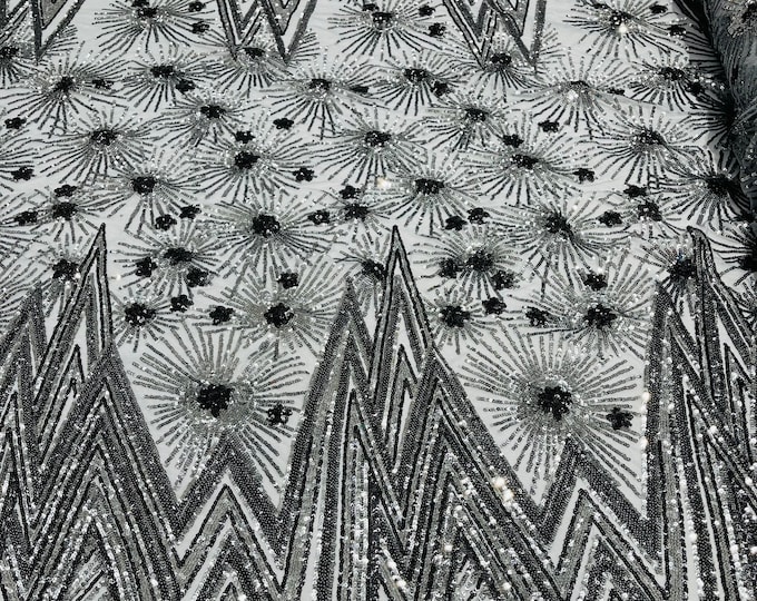 Gray/Silver geometric Star sequin design on a 4 way stretch mesh-sold by the yard.