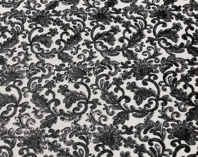 Black metallic corded embroider flowers with sequins on a mesh lace fabric-prom-sold by the yard.