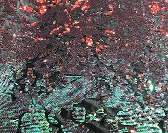 Red/ Green iridescent sequins flip two tone camouflage  design on a black stretch velvet, Sold by the yard.