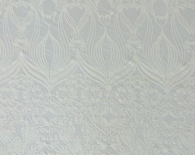 New White shiny sequin damask design on a 4 way stretch mesh-sold by the yard.