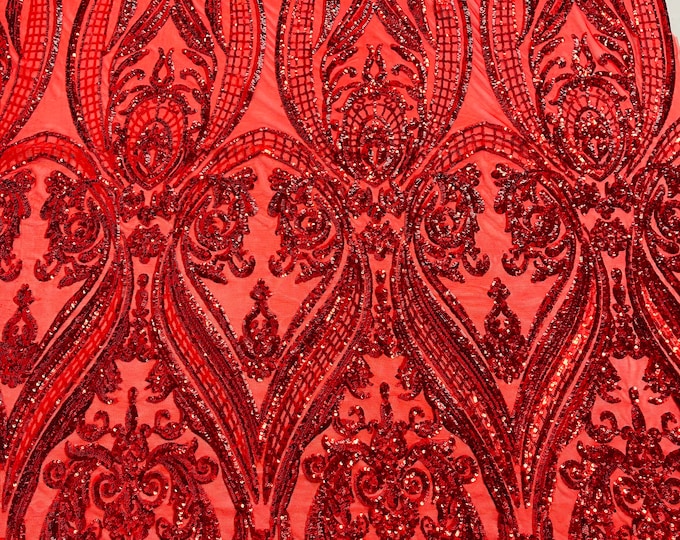 Red empire damask design with sequins embroider on a 4 way stretch mesh fabric-sold by the yard.