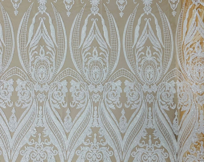 White empire damask design with sequins embroider on a Nude 4 way stretch mesh fabric-sold by the yard.