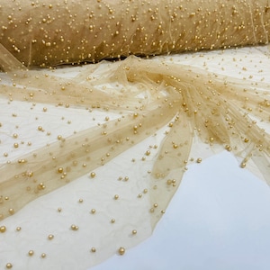 Gold Heavy Scattered Pearls Studded Mesh, 2-Way Stretch, sold by the yard.