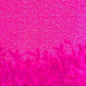 Neon Pink 5mm sequins on a stretch velvet with feathers  2-way stretch, sold by the yard