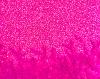 Neon Pink 5mm sequins on a stretch velvet with feathers  2-way stretch, sold by the yard