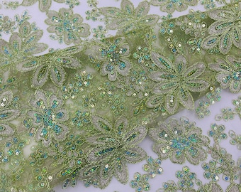 Sage Green Metallic Stars Floral Design Embroidered With Holographic Sequins On A Mesh Fabric.