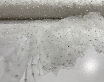White Scattered Pearls Studded Mesh, 2-Way Stretch, sold by the yard.