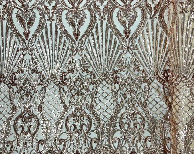Rose gold shiny sequin shell damask design on a 4 way stretch mesh fabric -prom-sold by the yard.