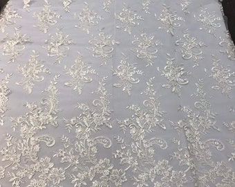 Ivory floral design embroidery on a mesh lace with sequins and cord-dresses-fashion-prom-nightgown-sold by the yard-free shipping in the USA