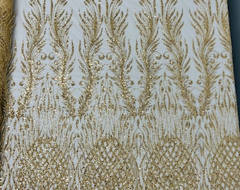 Gold feathers damask embroider and heavy beaded on a mesh lace fabric-sold by the yard-