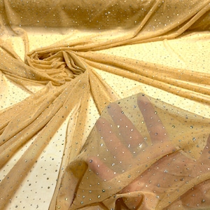 Gold Sheer All Over AB Rhinestones On Stretch Power Mesh Fabric, Sold by The Yard.