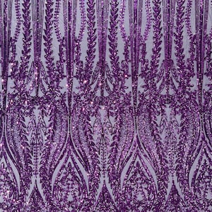 Dark Purple damask design with sequins embroider on a 4 way stretch mesh fabric.