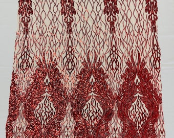 Red iridescent damask sequin design on a nude 4 way stretch mesh fabric-prom-sold by the yard.