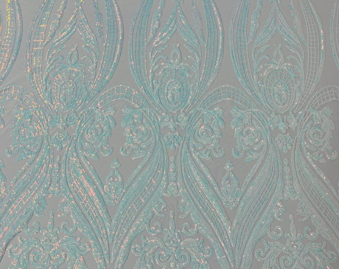 Clear Aqua iridescent empire damask design with sequins embroider on a White 4 way stretch mesh fabric-sold by the yard.