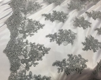 Gray flower lace corded and embroider with sequins on a mesh. Wedding/bridal/prom/nightgown fabric. Sold by the yard.