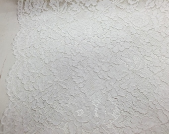 Offwhite vintage corded french lace embroider on a antique mesh. Wedding/Bridal/Nightgowns/Prom-sold by the yard .