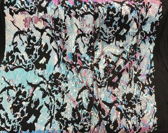 Aqua iridescent sequins on a black 2 way stretch velvet-apparel-fashion-sold by the yard.