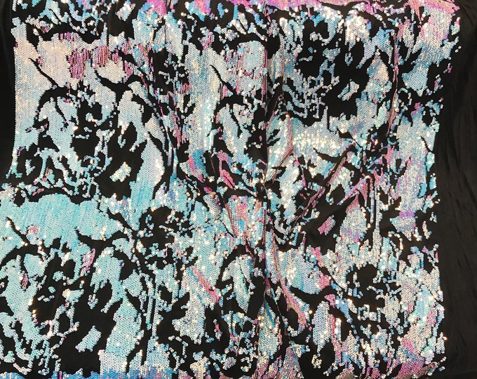 Aqua iridescent sequins on a black 2 way stretch velvet-apparel-fashion-sold by the yard.