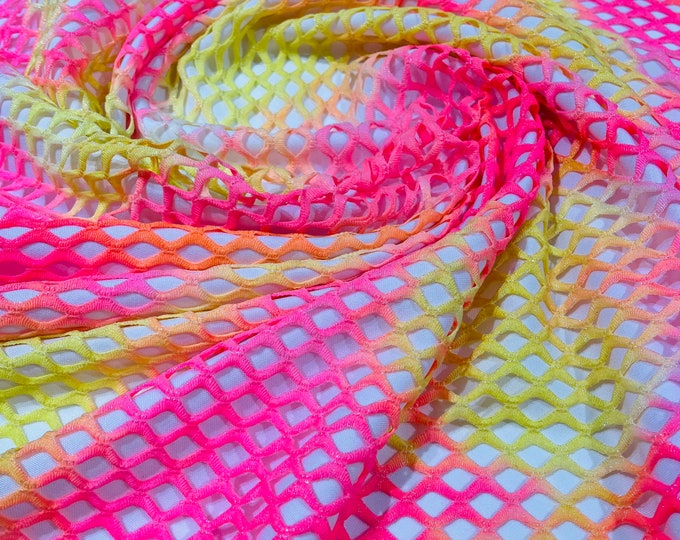 Neon pink/Neon Yellow big fishnet diamond mesh tie dye with silver glitter 4 way stretch 58/60 inches wide. Sold by the yard.