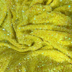Neon Yellow Iridescent sequins all over a yellow stretch velvet , sold by the yard.