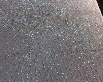 Iridescent White Sequins diamond design embroidery on a white 4 way stretch power mesh-dresses-fashion-apparel-prom-nightgown-Sold by yard.