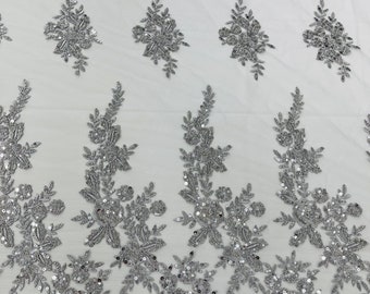 Silver floral design embroider and beaded on a mesh lace fabric-Wedding/Bridal/Prom/Nightgown fabric.