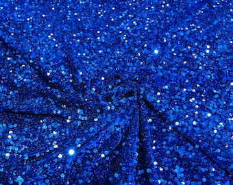 Royal blue 5mm sequins on a stretch velvet 2-way stretch, sold by the yard.