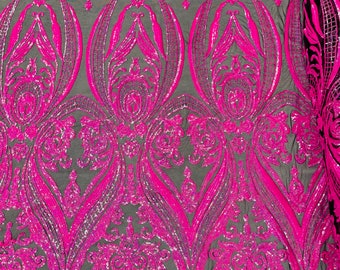 Neon Hot Pink iridescent empire damask design with clear sequins embroider on a Black 4 way stretch mesh fabric-Sold by the yard.