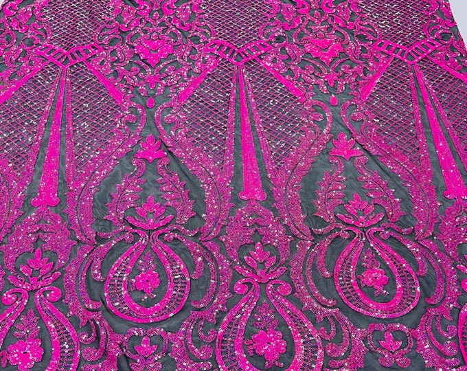 Hot pink princess design iridescent sequins embroidery on a 4 way stretch black mesh-dresses-apparel-prom-nightgown-sold by the yard.