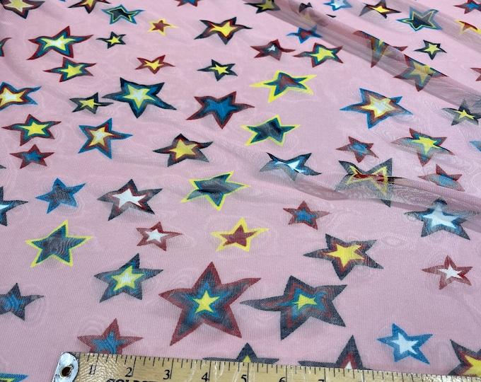 Multi color star design on a Dusty pink power mesh 4-way stretch 58"-Sold by the yard