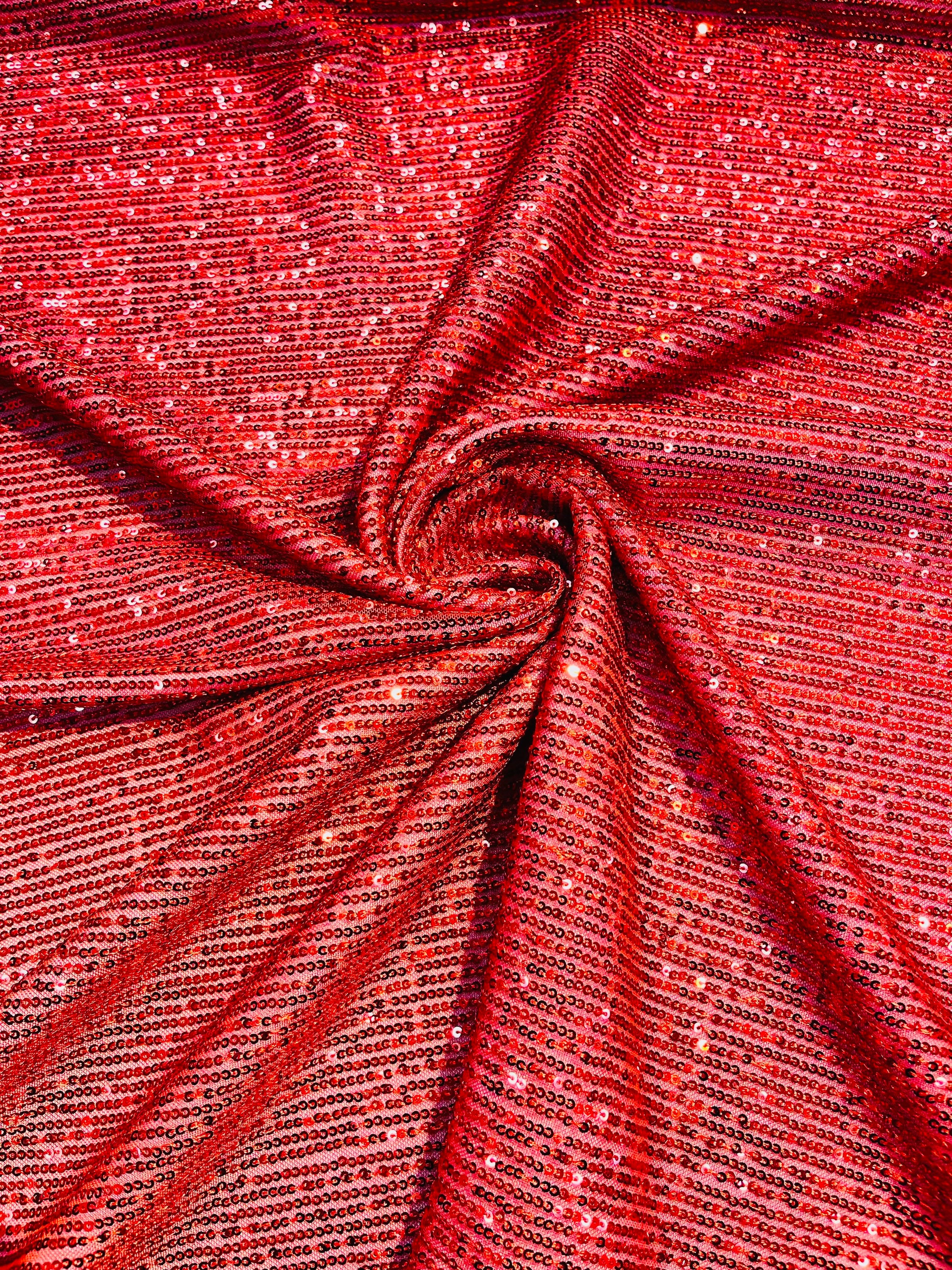 New Royalty sequin design on a 4 way stretch mesh fabric-sold by the yard.