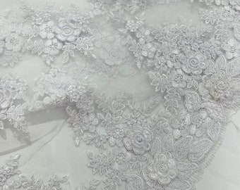 White corded lace 3d floral embroider sold by the yard.