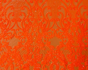 Neon orange damask design on a 4 way stretch mesh-prom-sold by the yard.