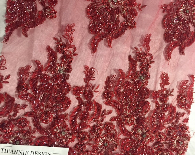 Red flowers embroider and heavy beaded on a mesh lace fabric-sold by the yard-