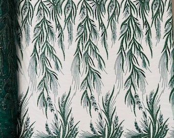 Hunter Green Fiesta Design Embroider and heavy beading on a mesh lace-sold by the yard.