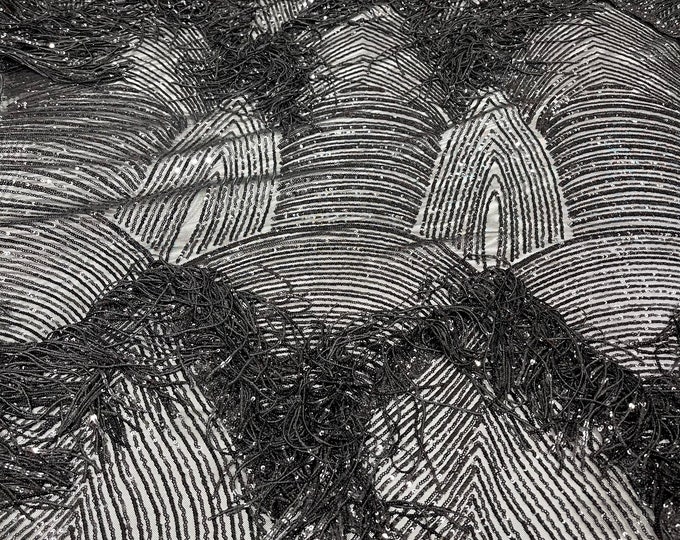 Black shiny fringe sequins design on a 4 way stretch mesh fabric-prom-sold by the yard.